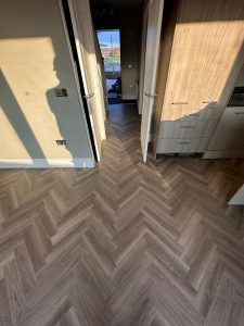 Amtico LVT supplied and fitted in this plot on behalf of Redrow Homes @ Stonehouse - Phase 2B. FItted herringbone style - colour White Ash 18x4