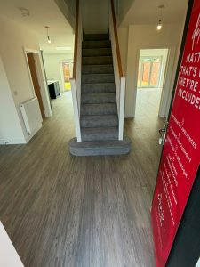 Amtico First LVT colour Heron Oak. Ascend Premium carpets colour Cornstalk